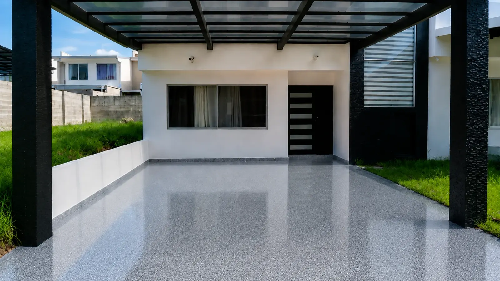 Residential carport with an installed epoxy floor